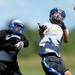 Lincoln football reach for the ball during practice at the school on Wednesday, August 14, 2013. Melanie Maxwell | AnnArbor.com